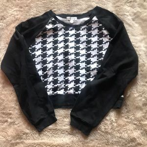 White and black cropped top.